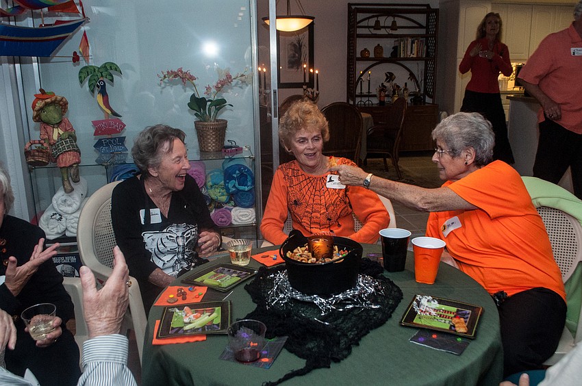 Guests joke at the Harvest Host Dinner.