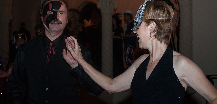 Souhad and Tess Chawi dance to the music at the event.