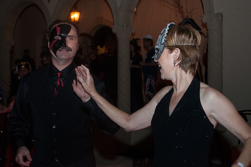 Souhad and Tess Chawi dance to the music at the event.