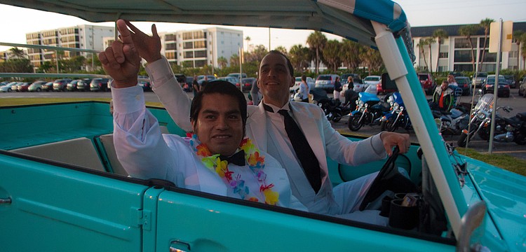Jesus Carrera and Kevin Cooper pose as Tattoo and Mr. Roarke in a Surf Side Free Ride car.