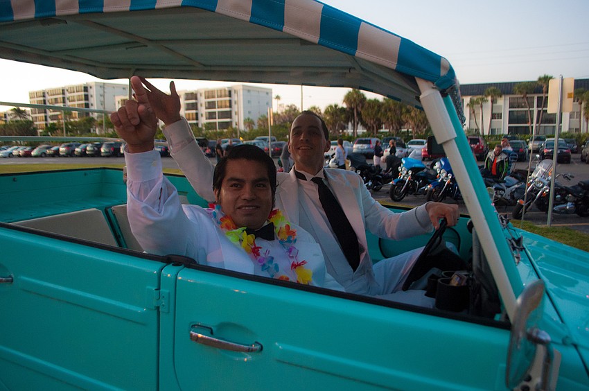 Jesus Carrera and Kevin Cooper pose as Tattoo and Mr. Roarke in a Surf Side Free Ride car.