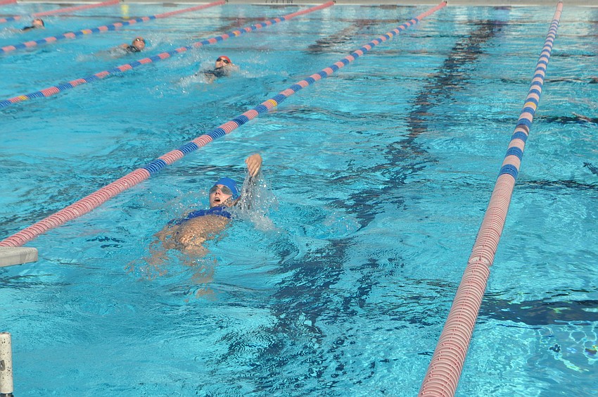 Alexis Zinkl a sophomore at Canterbury High School competes in the girls 100-yard breaststroke.