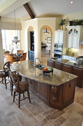 The Montego model in The Vineyards at The Lake Club has a double island in the kitchen.