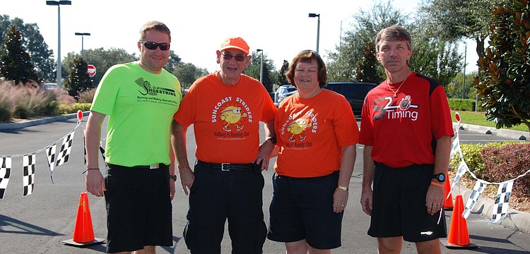 Volunteers Matt Hitchcock, Steve Litschauer, Sharon Litschauer and Jim Larsen gathered together for a photo.