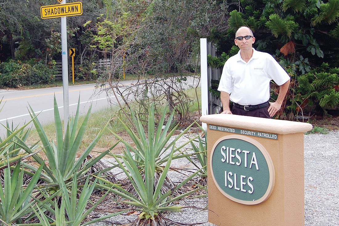Siesta Isles Association President Tony Romanus spearheaded an effort to improve visibility at a dangerous curve on Midnight Pass Road.