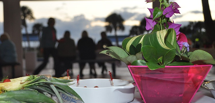 Sherry Linhart said her favorite part of organizing the barbeque was putting together the flower arrangements.