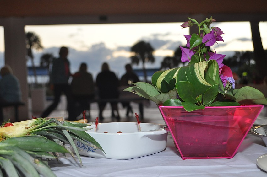 Sherry Linhart said her favorite part of organizing the barbeque was putting together the flower arrangements.