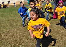 Jocelyn Lerma sprinted to the front as her class began its walk.