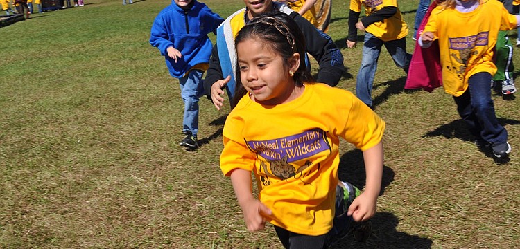 Jocelyn Lerma sprinted to the front as her class began its walk.