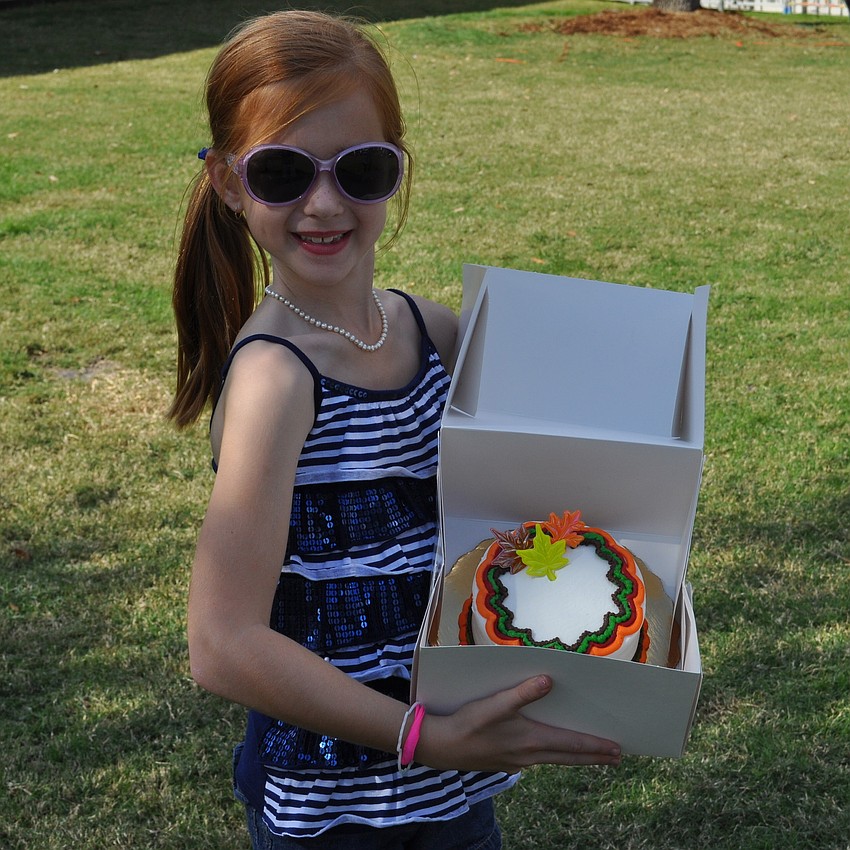 Kendall Douley won the cake walk competition.