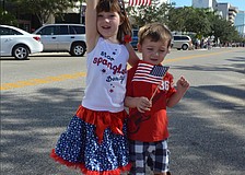 Siblings Claire and Hudson Toale waved their American flags.