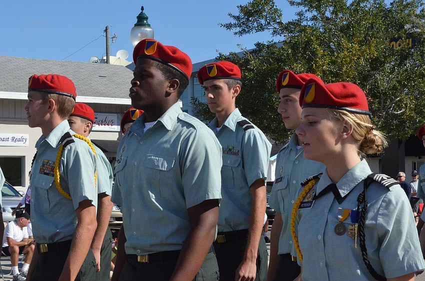 JROTC students march.