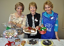 Ruth German, Peggy Sloan and Christine Rose Kennedy worked the food table Saturday, Nov. 17, at Longboat Key Island Chapel Holiday Bazaar.