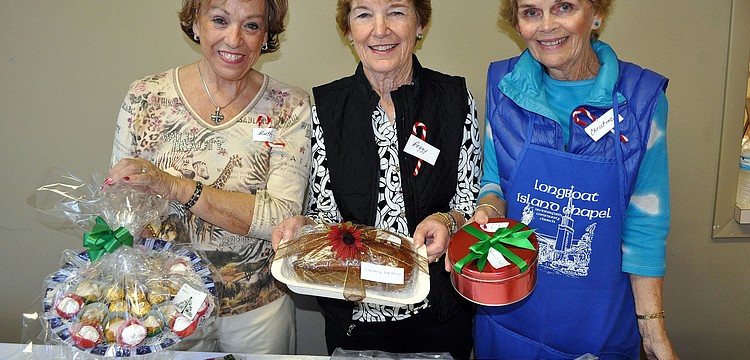 Ruth German, Peggy Sloan and Christine Rose Kennedy worked the food table Saturday, Nov. 17, at Longboat Key Island Chapel Holiday Bazaar.