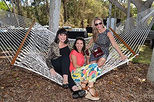 Anne Weintraub, Aimee Cogan and Kelly Gettel lounge around on the hammock at "The Artful Lobster."