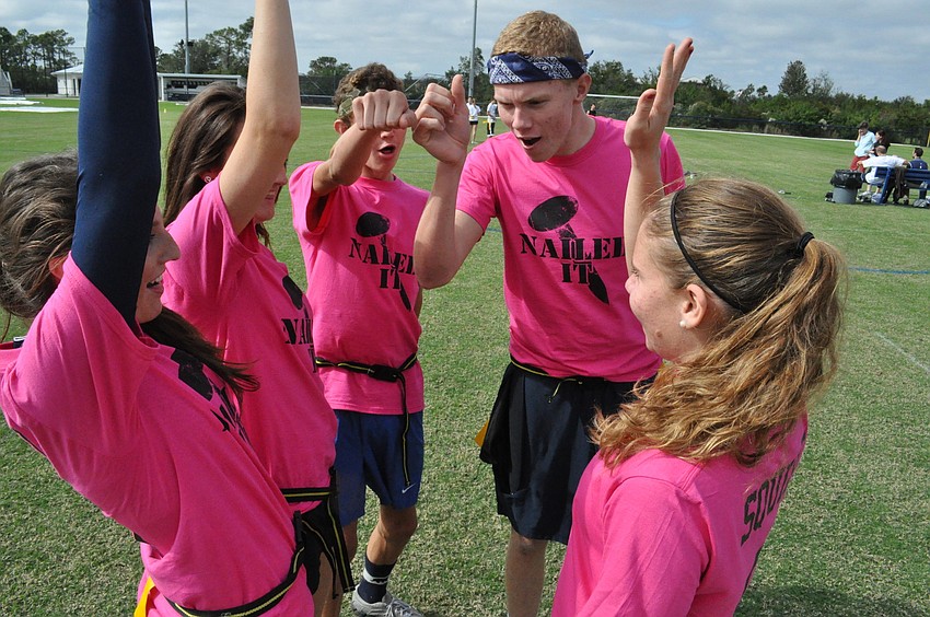 Members of Team Nail It huddled with excitement, before the start of their next match-up.