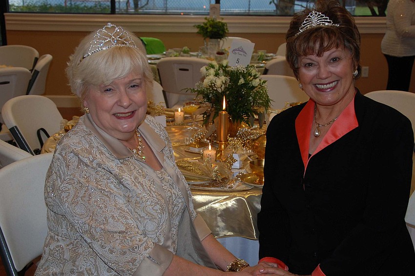 Sheri Miller and Jeanne Larranaga posed for a photo while wearing their tiaras.