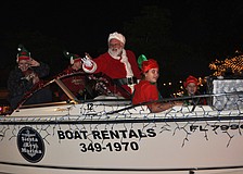 Santa rode in parade in style Saturday, Nov. 24, during Siesta Keyâ€™s Light Up the Village parade.