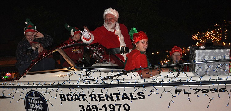 Santa rode in parade in style Saturday, Nov. 24, during Siesta Keyâ€™s Light Up the Village parade.