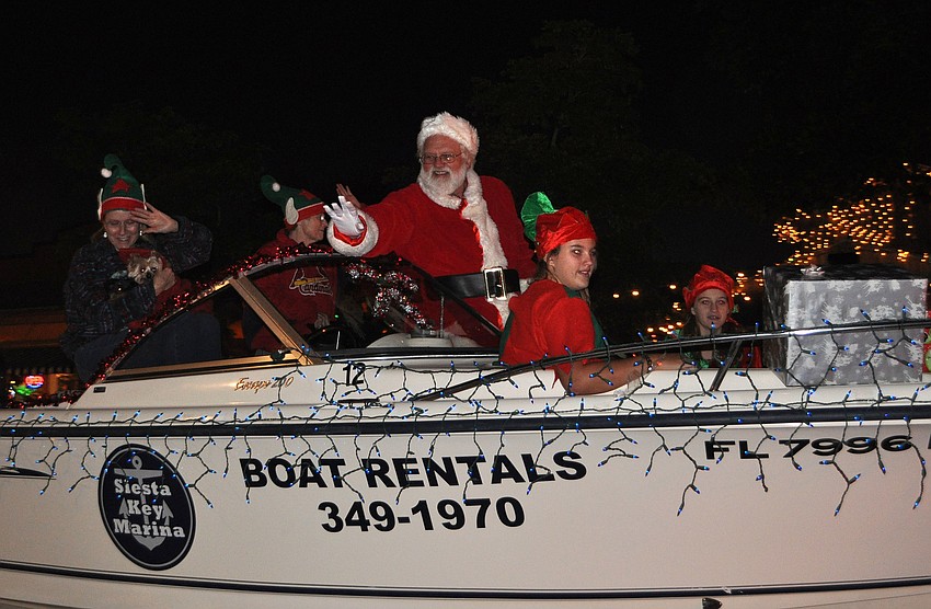 Santa rode in parade in style Saturday, Nov. 24, during Siesta Keyâ€™s Light Up the Village parade.