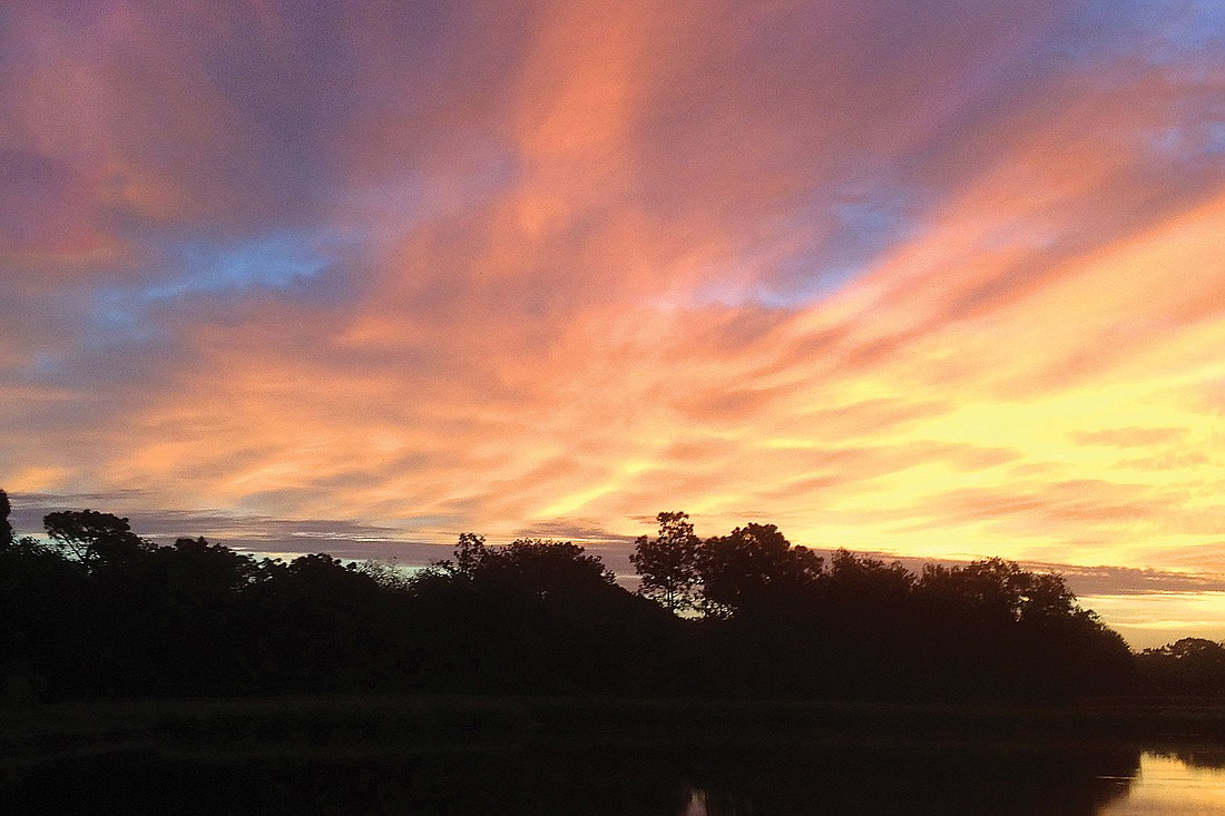 Denise Pope took this sunrise photo while jogging in the early morning in River Club.
