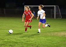 Cardinal Mooneyâ€™s Abby Goecker, No. 2, and Sarasota Christianâ€™s Danielle Buncik, No. 6, both go after the ball.