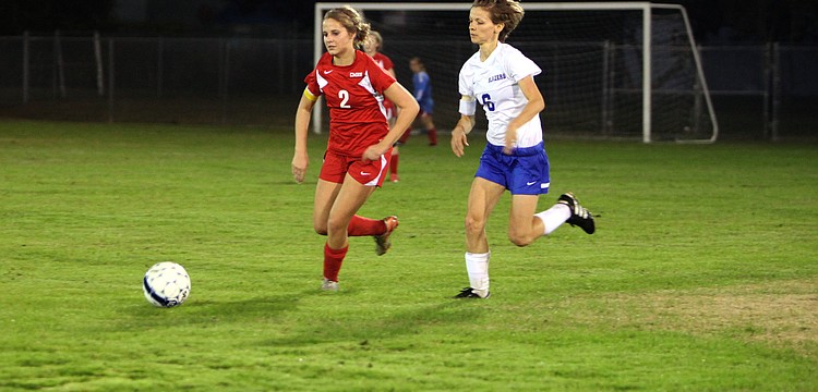 Cardinal Mooneyâ€™s Abby Goecker, No. 2, and Sarasota Christianâ€™s Danielle Buncik, No. 6, both go after the ball.