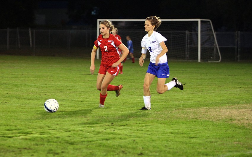 Cardinal Mooneyâ€™s Abby Goecker, No. 2, and Sarasota Christianâ€™s Danielle Buncik, No. 6, both go after the ball.