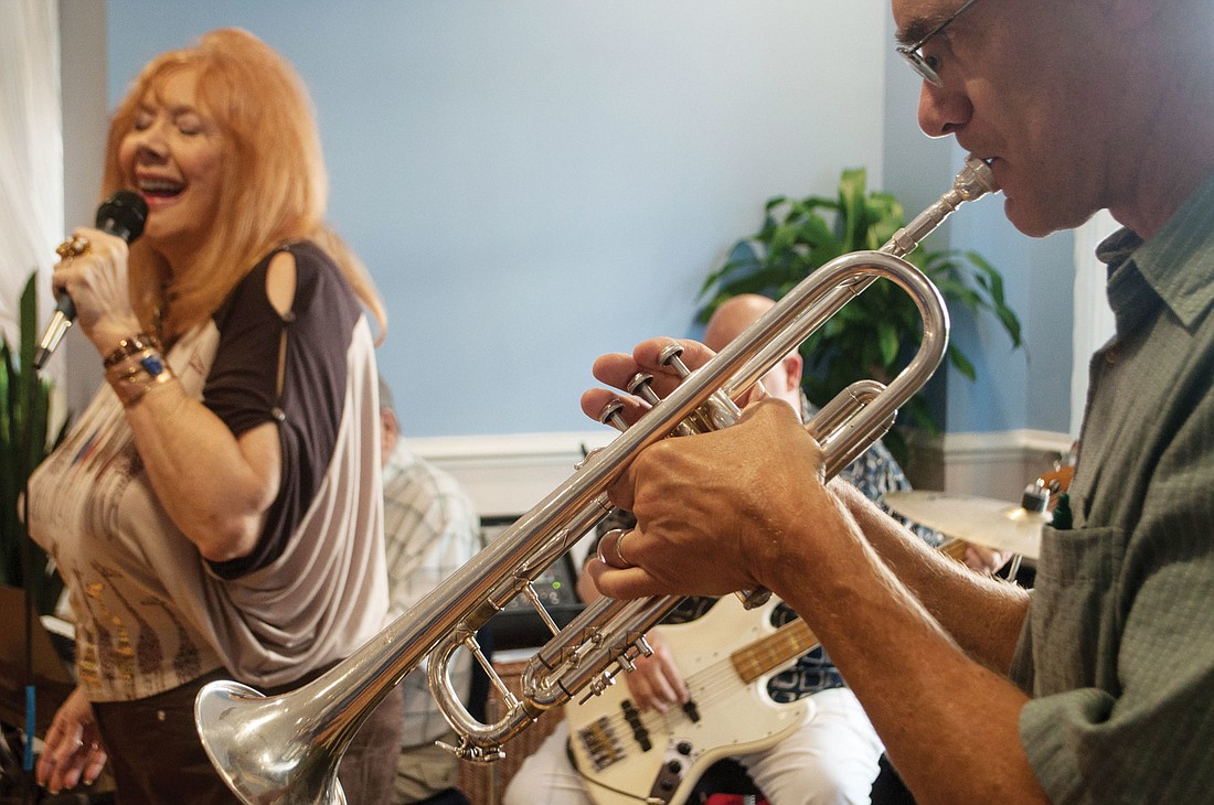 Bob Delfassee plays the trumpet, and Jody Edwards sings. Photo by Yaryna Klimchak.