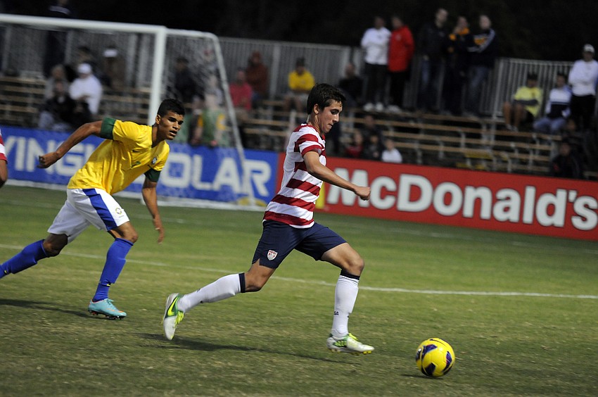 U.S. midfielder Christopher Lima brings the ball up the field during the first half of the U.S. Under-17 Menâ€™s National Teamâ€™s 4-4 draw against Brazil Nov. 28.