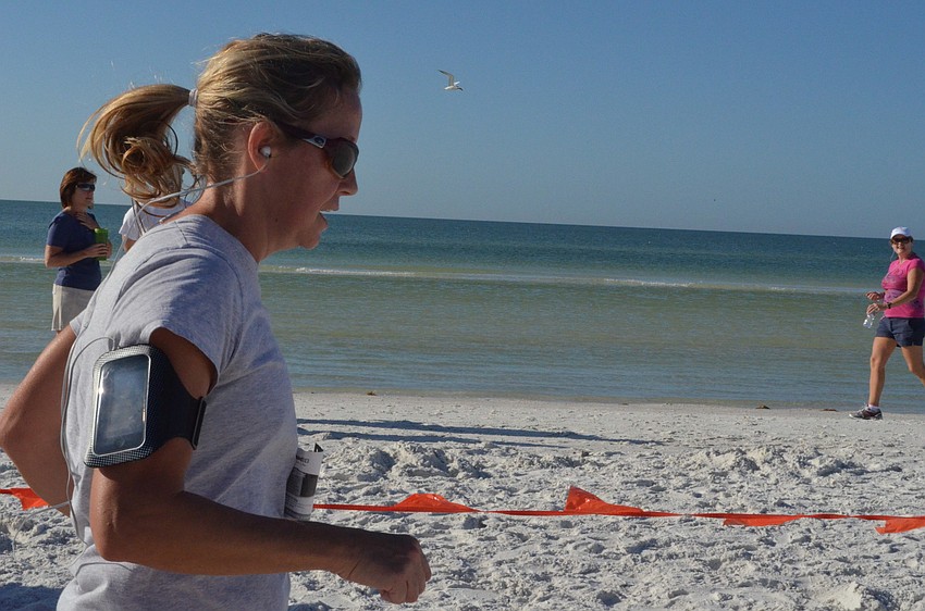 Crissy Zika finishes the 5K strong.