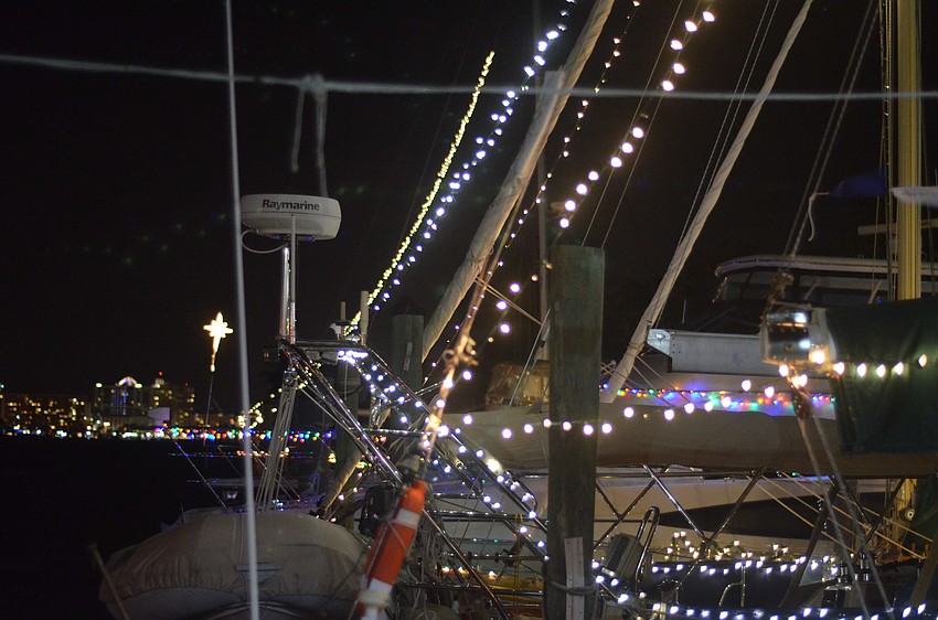Bird Key Yacht Club members decorated their yachts with Christmas lights for the ceremony.