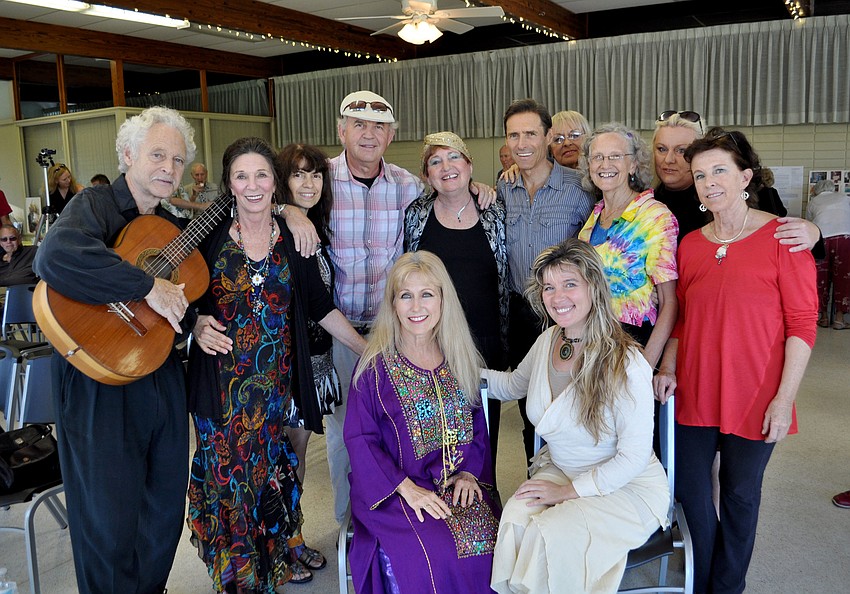 Organizers of the tribute pose before the memorial begins.
