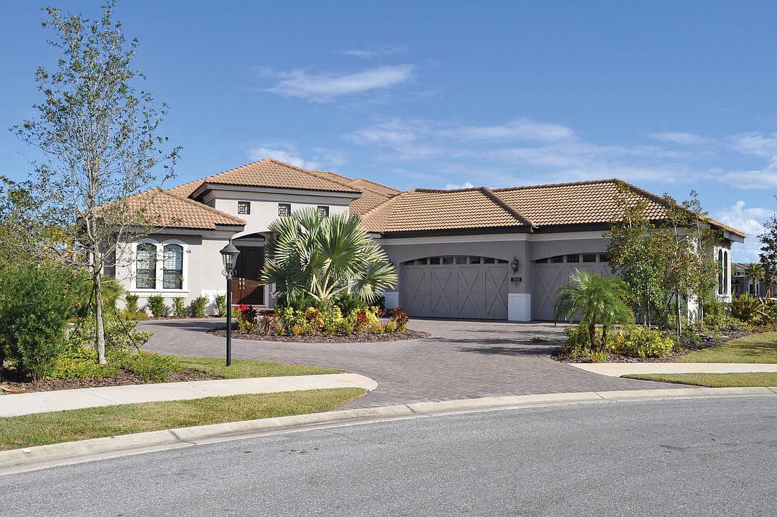 This Country Club East at Lakewood Ranch home, which has four bedrooms, four baths, a pool  and 3,588 square feet of iiving area, sold for $845,000. Josh Siegel.