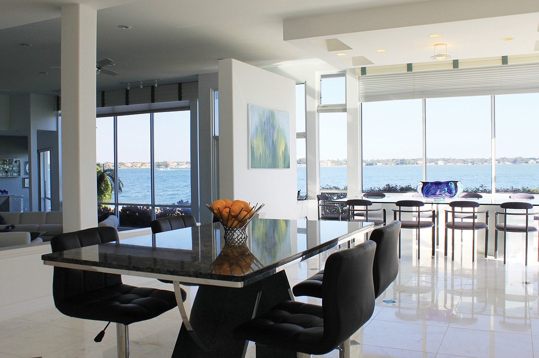 The home at 491 Meadow Lark Drive features marble floors and overlooks Sarasota Bay. Courtesy photos.