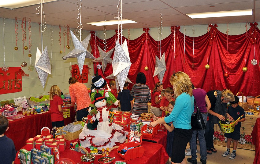 The Holiday House at Southside Elementary is a busy place this week with students buying gifts for their friends and family.