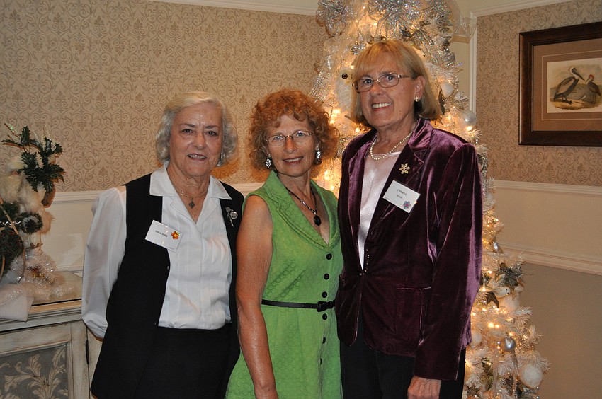 Dina Hink, a fifth-year Garden Club member, with Anne Brahler and Cheryl Kail, both first-year members