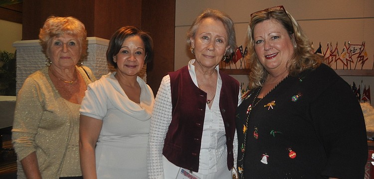 Regina Brown, Vilma Cooper of Saks Fifth Avenue, Zenobia Davis, Vicki Cole of Saks Fifth Avenue