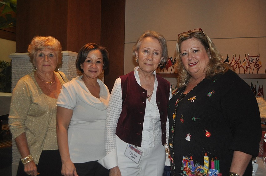 Regina Brown, Vilma Cooper of Saks Fifth Avenue, Zenobia Davis, Vicki Cole of Saks Fifth Avenue