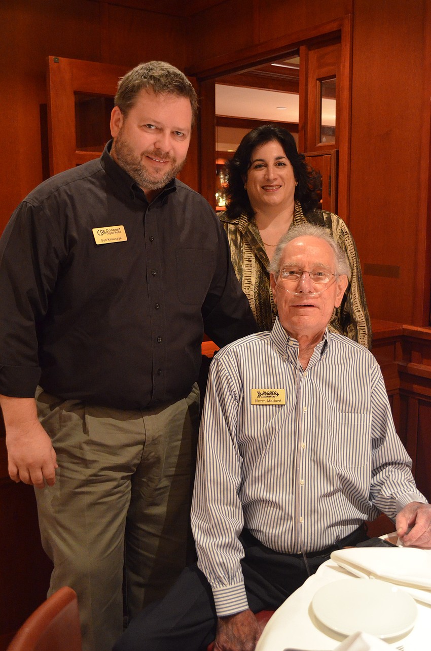 Syd Krawczyk with his wife Alice and Norm Mallard
