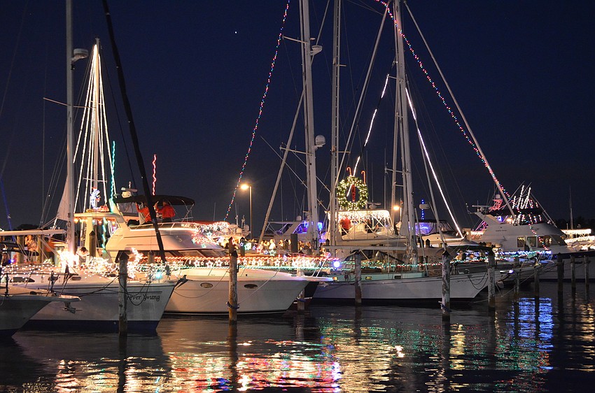 Colorful Christmas lights lit up the boats and the marina.