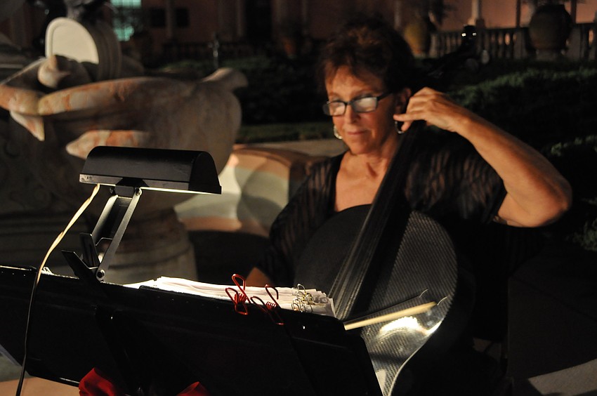 Lucia Barrett plays the cello for the crowd.