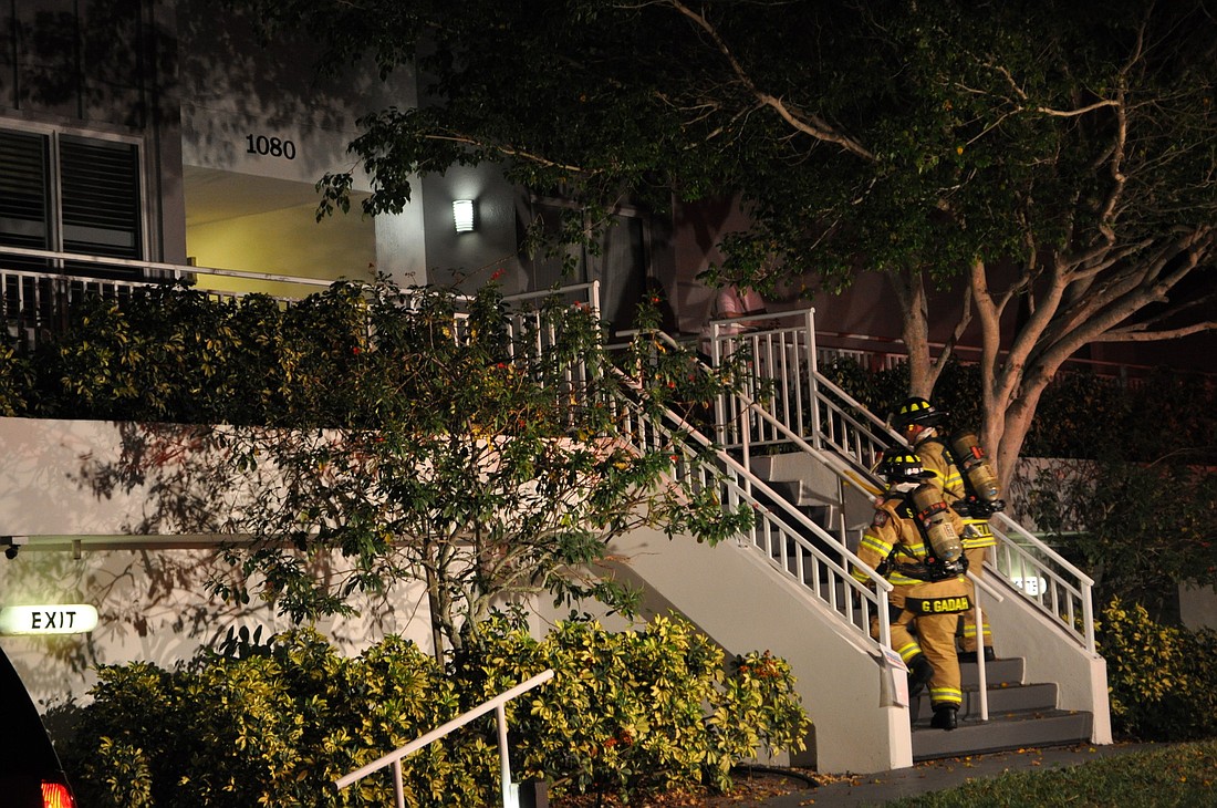 Sarasota County firefighters enter the central property at Peppertree Bay shortly after 7 p.m. Sunday, Dec. 9.