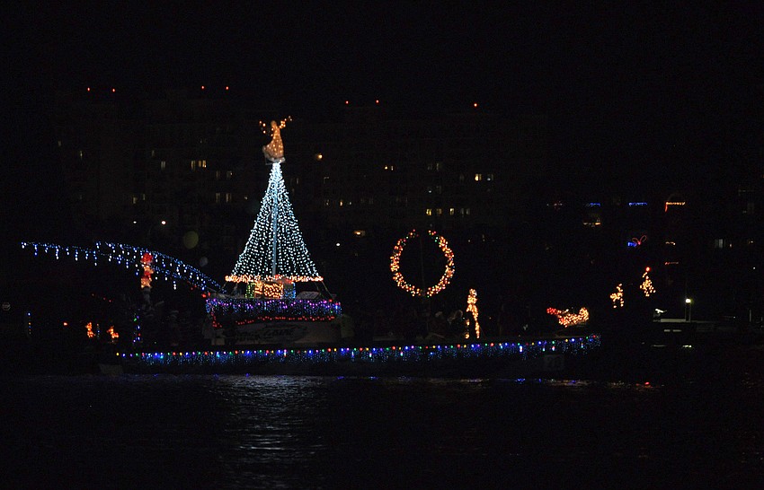 A Christmas tree with an angel on top, a wreath, Santaâ€™s sleigh and reindeer all made of lights made this boat shine on the water Saturday, Dec. 8, during the 26th Annual Sarasota Christmas Boat Parade.