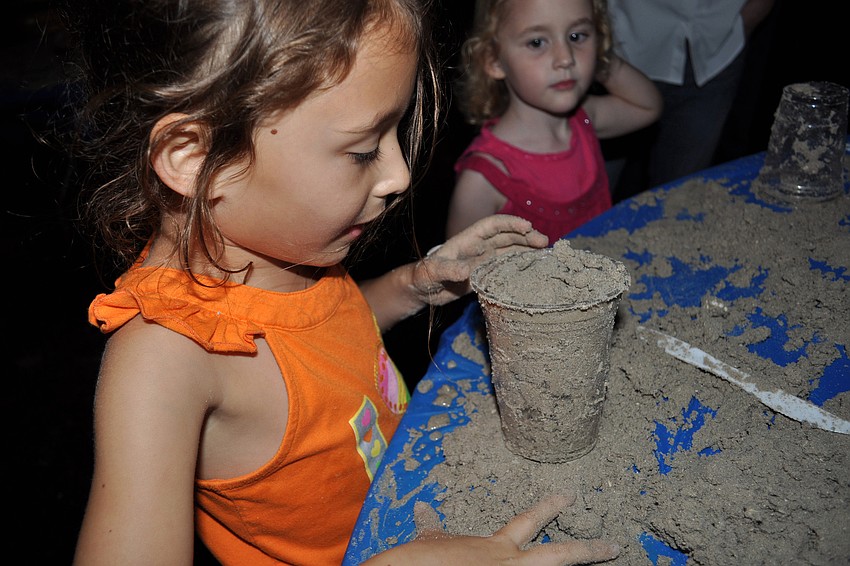 Lily Schlosberg, 5, learned how to make a menorah out of sand.