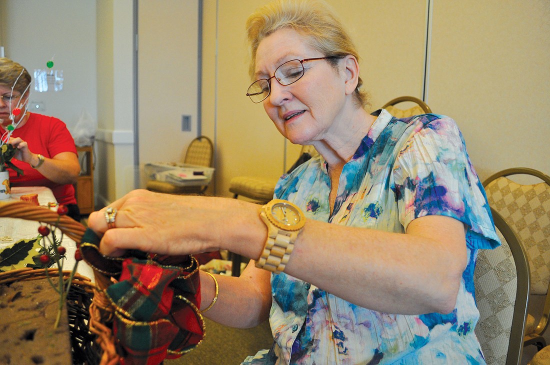 "It's a lot of fun," club member Cheryl Griesbach said of the arrangement-making activity. "We're all learning."
