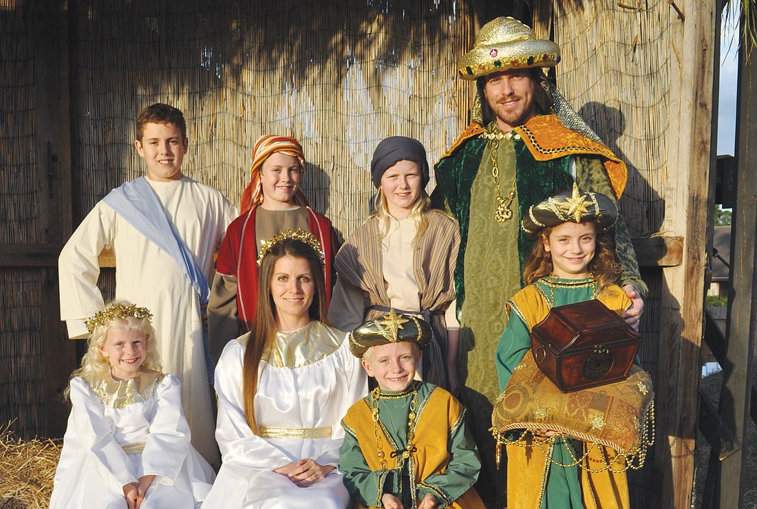 The Wiegand family has made participating in the Living Nativity a family tradition. Pictured clockwise from bottom left are: Fairyn, Alexander, Benjamin, Catherine, Lance, Elizabeth, Davis and Sarah.