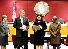 Sarasota County Commissioners Joe Barbetta, Nora Patterson, Christine Robinson, Carolyn Mason and Jon Thaxton surprised Interim County Administrator Terry Lewis [third from left] with special recognition for his service on Jan. 11.