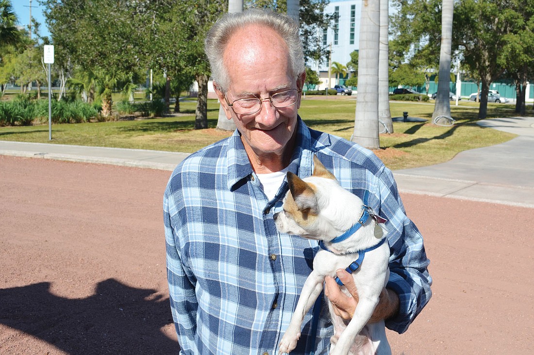 Arnold Rich with Peanut. Rich said larger, unleashed dogs have run up to Peanut.