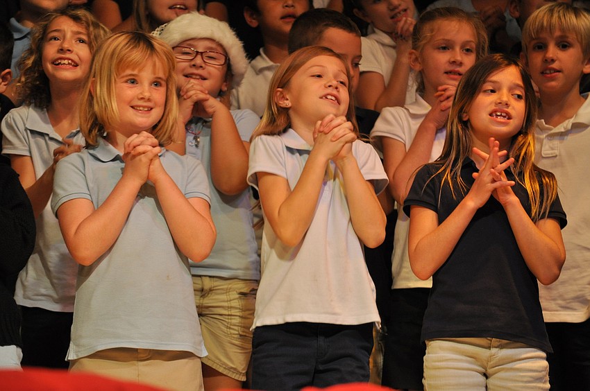 Kayla Wackerbauer, Wesly Viquerat and Julia Reed sang with gusto.
